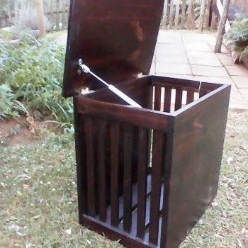 Stained pine laundry basket with gas shocks