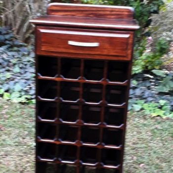 Solid stained saligna wine rack with drawers and serving top