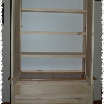 Solid pine wardrobe with door open